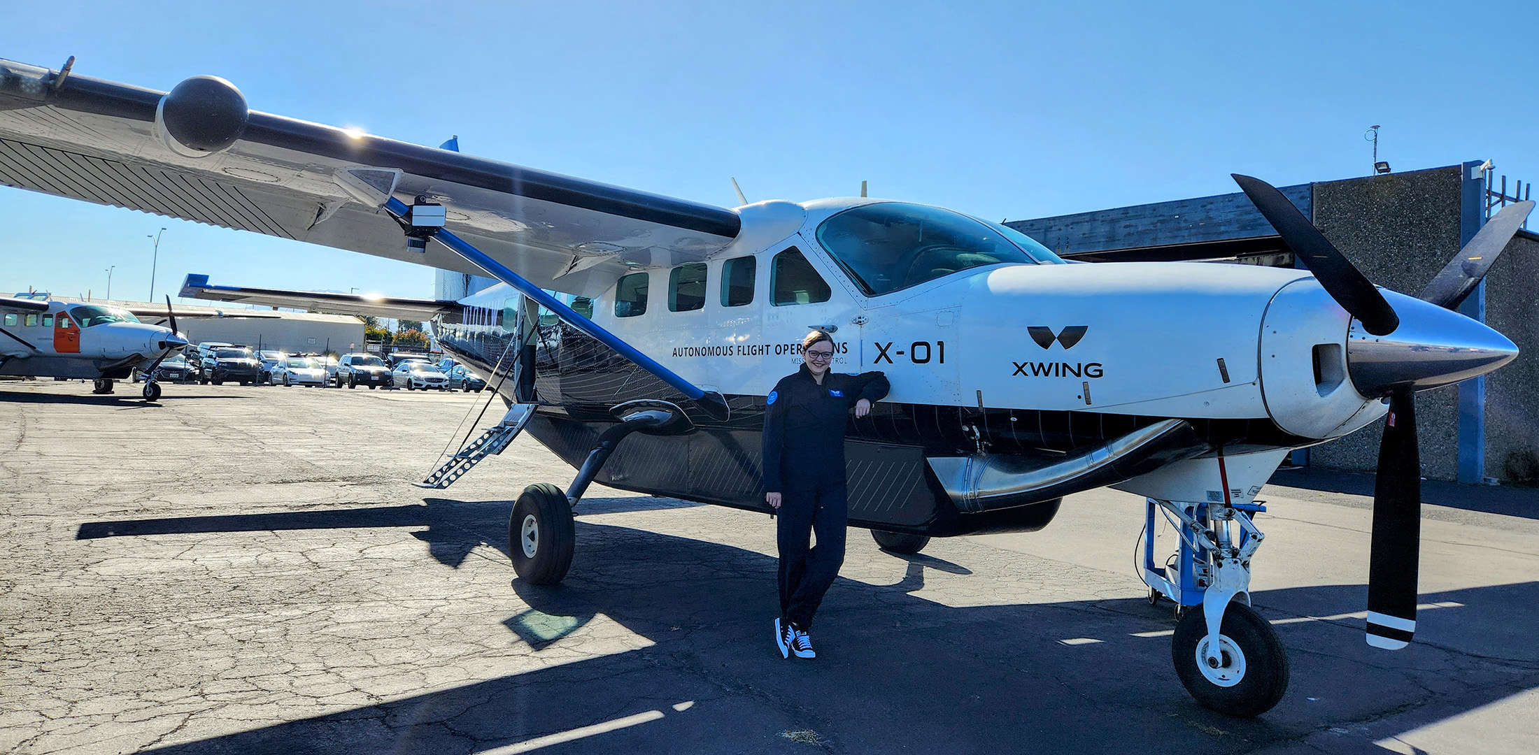 FutureFlight reporter Hanneke Weitering poses with Xwing's modified Cessna plane.