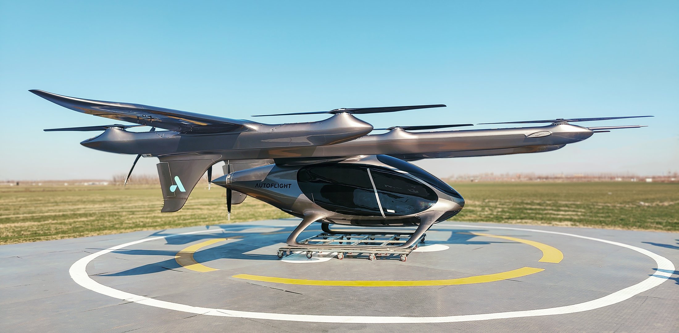 AutoFlight's Prosperity I eVTOL aircraft is pictured on a landing pad.