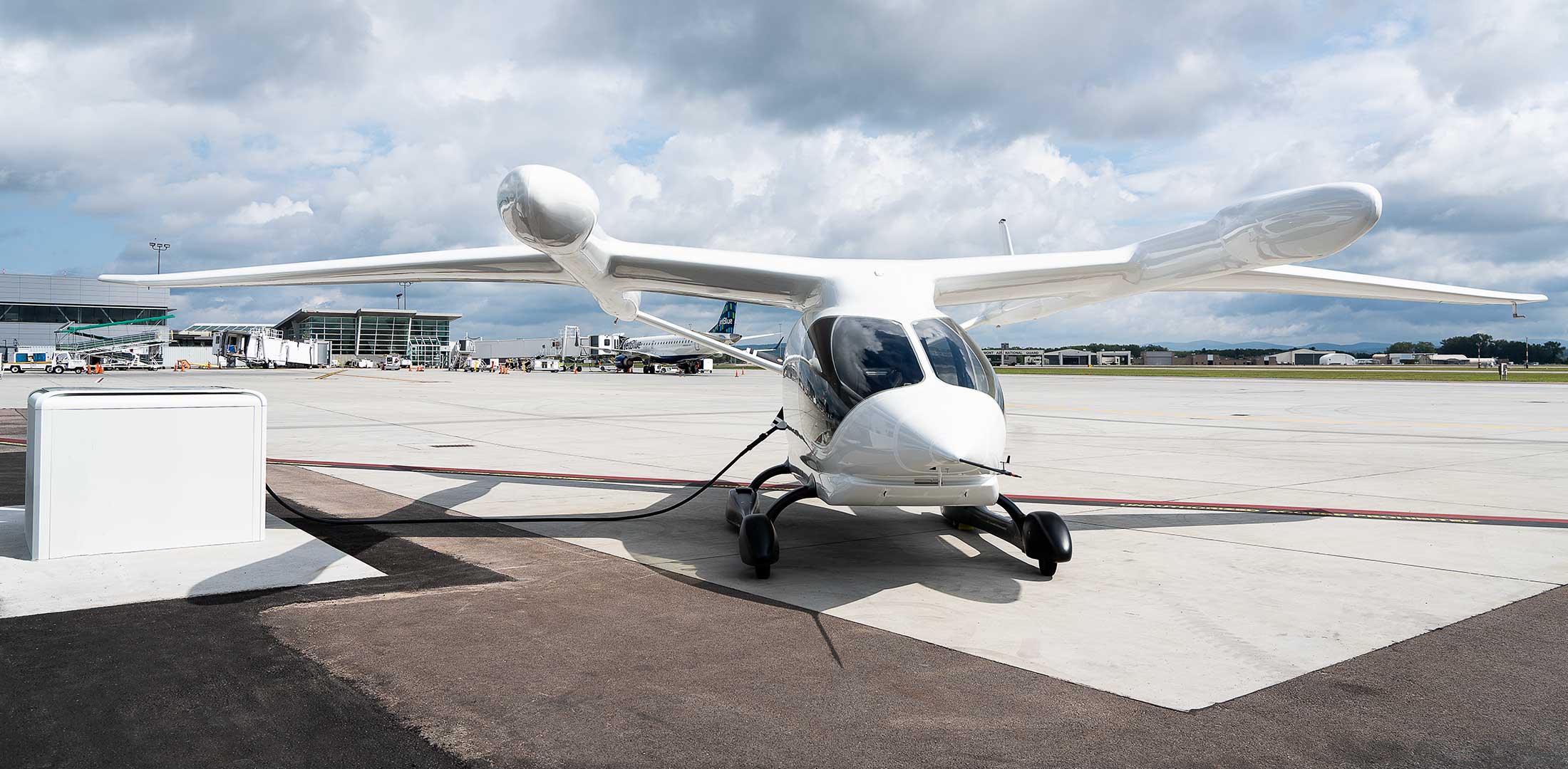 Beta's Alia electric airplane is pictured at an airport charging station