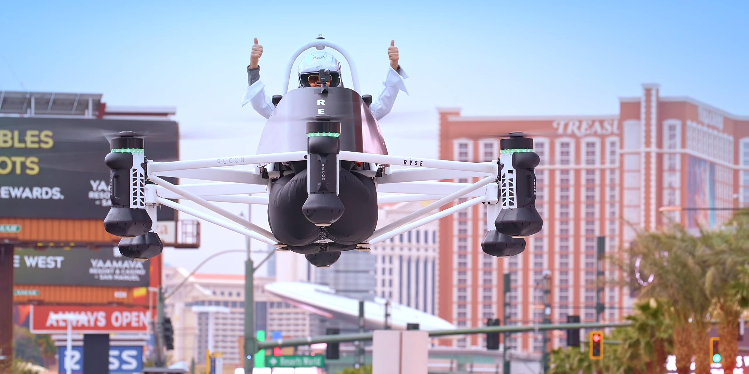 Erik Stephansen, Ryse’s director of regulatory affairs and aerodynamics, gives two thumbs up as he flies the Recon over Las Vegas during the 2023 Consumer Electronics Show.