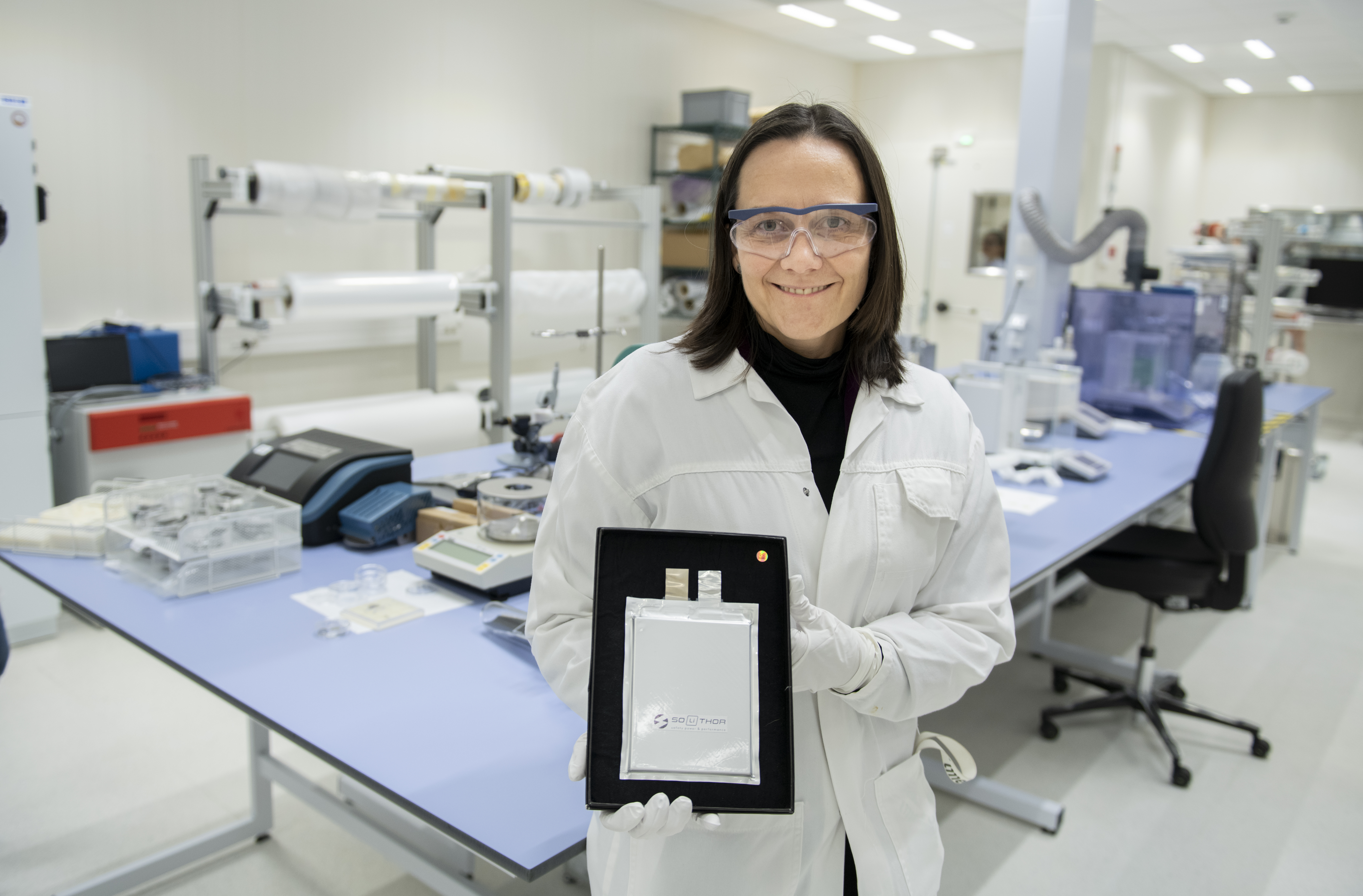 Solithor co-founder and chief technology officer Fanny Bardé with an example of the company's pouch cell batteries.