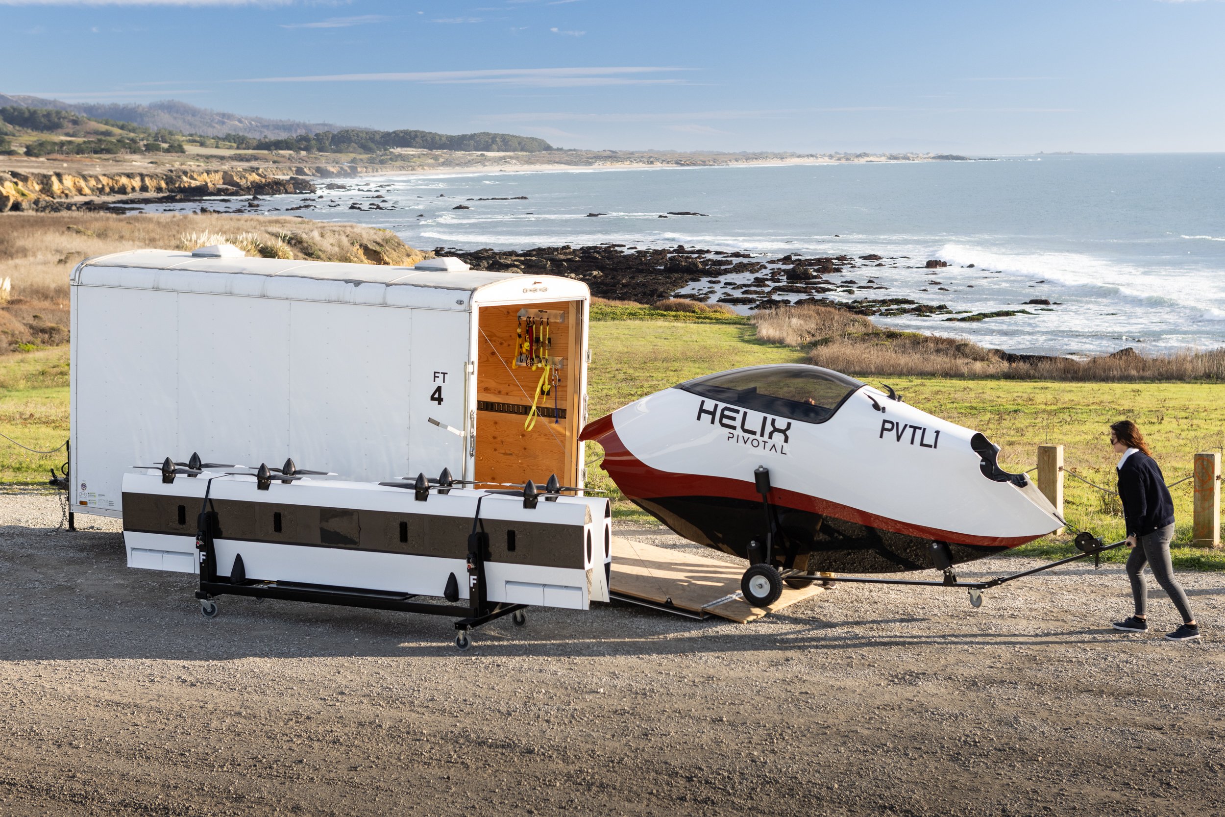 A Helix aircraft is loaded into a trailer for transport