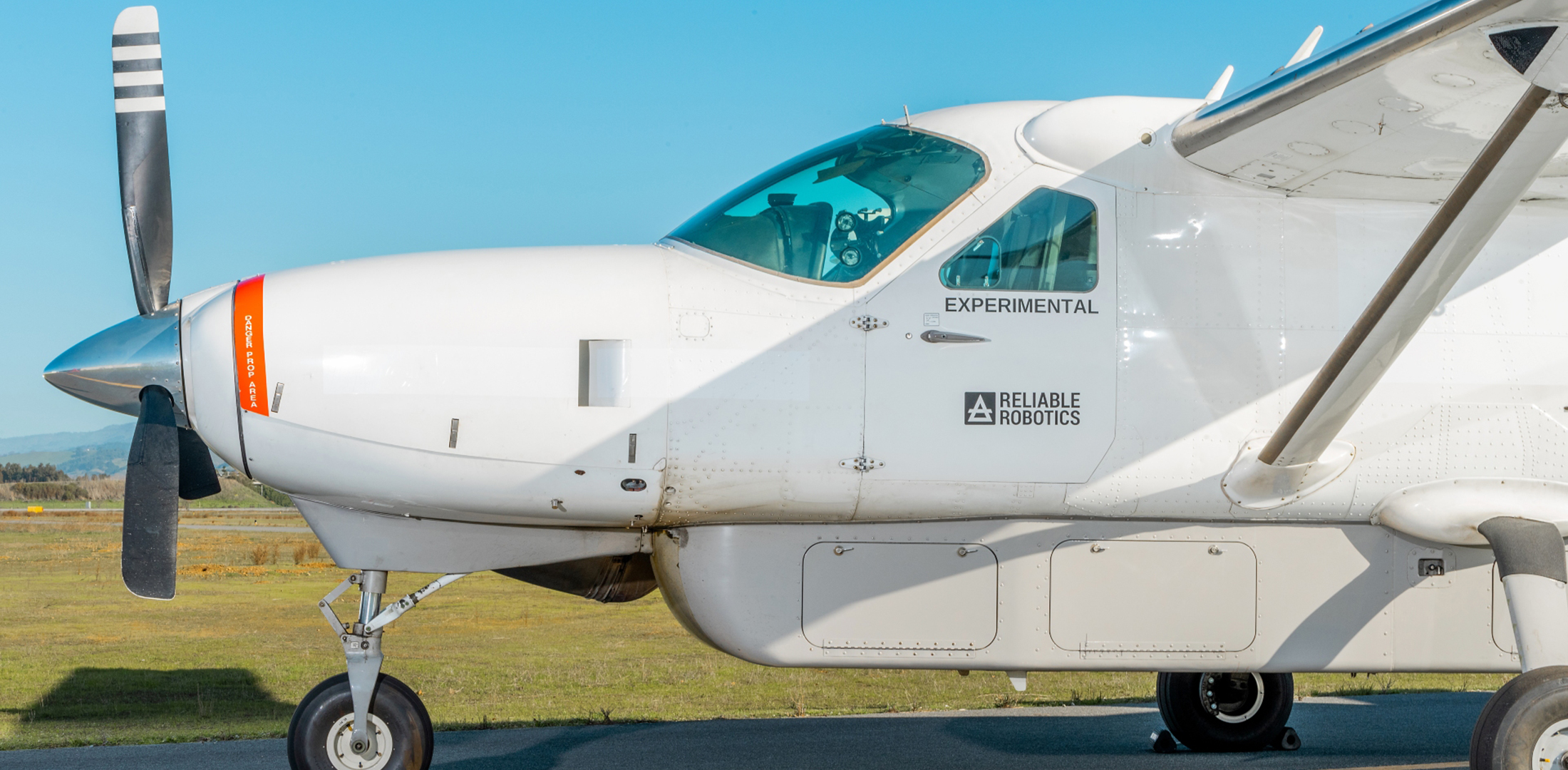 A Reliable Robotics Cessna Grand Caravan is pictured on a runway