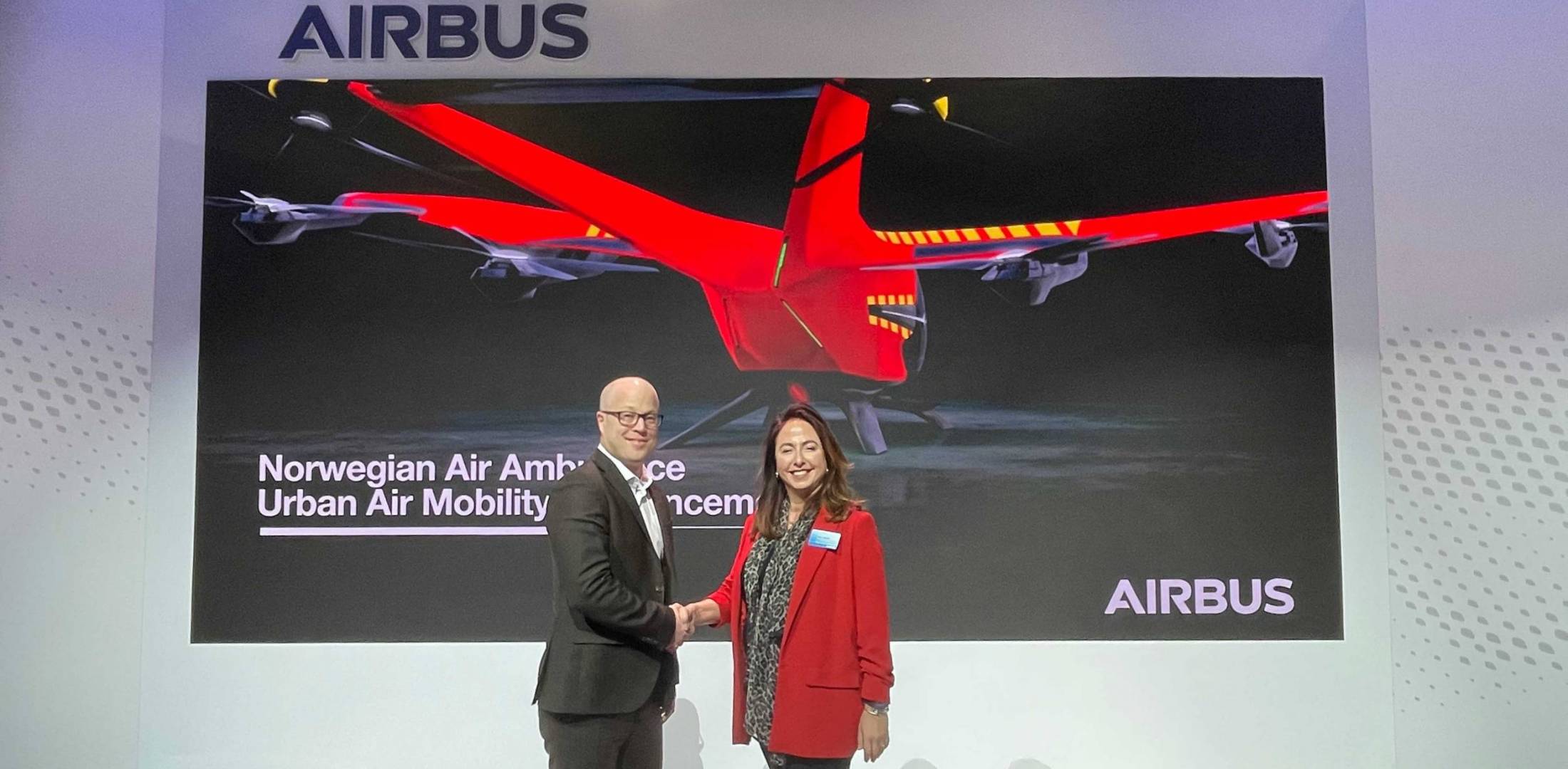 Leif Olestad (left), representing the Norwegian Air Ambulance Foundation, announced a partnership with Airbus' head of urban air mobility Balkiz Sarihan.