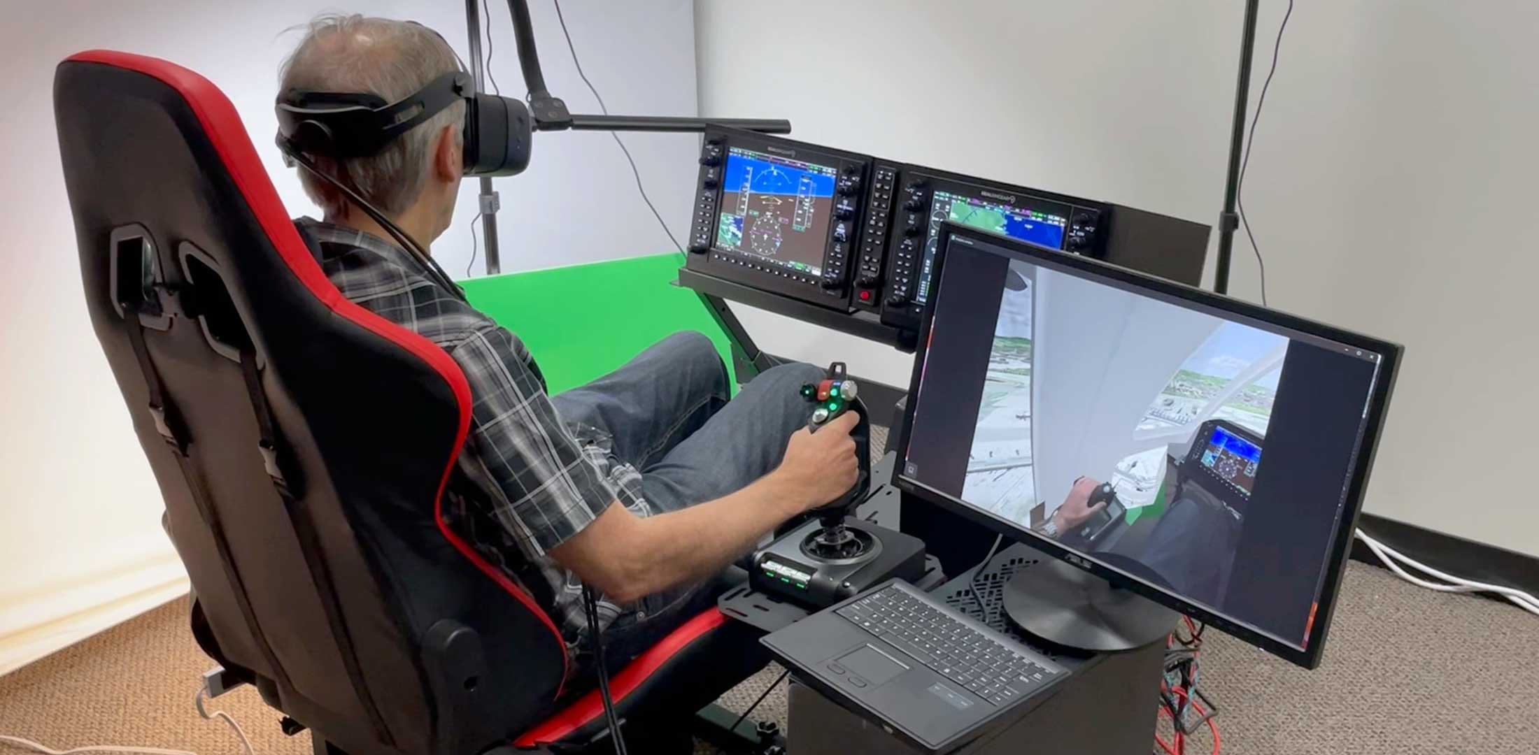 A person wearing a VR headset uses Quantum3D's Limosa simulator