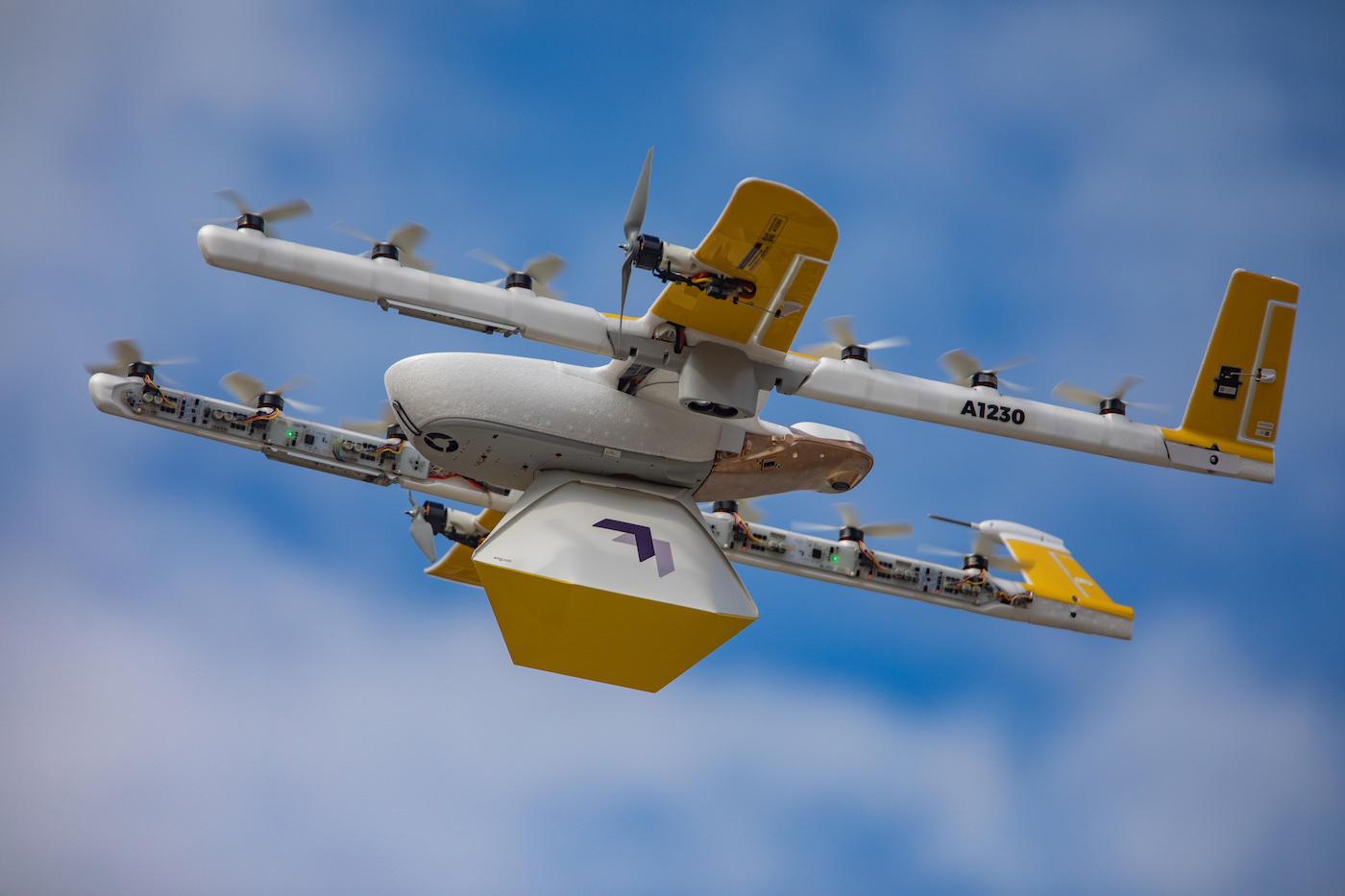 Wing delivery unmanned aircraft