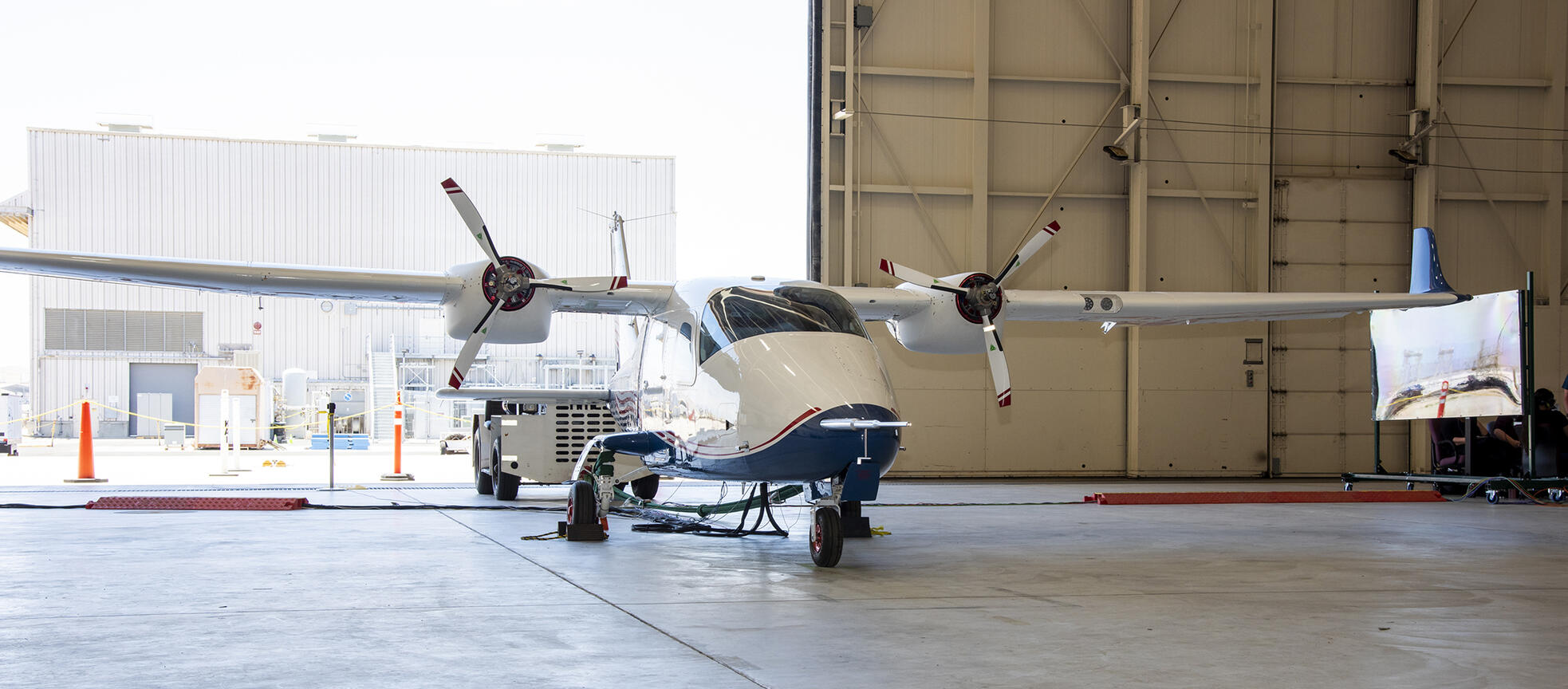 NASA's X-57 "Modification II" is pictured in the hangar.