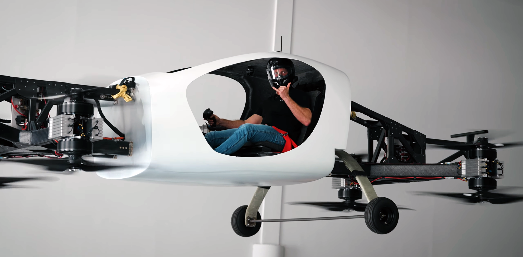 Doroni founder and CEO Doron Merdinger is pictured flying the H1 personal eVTOL inside the company's Pompano Beach headquarters.