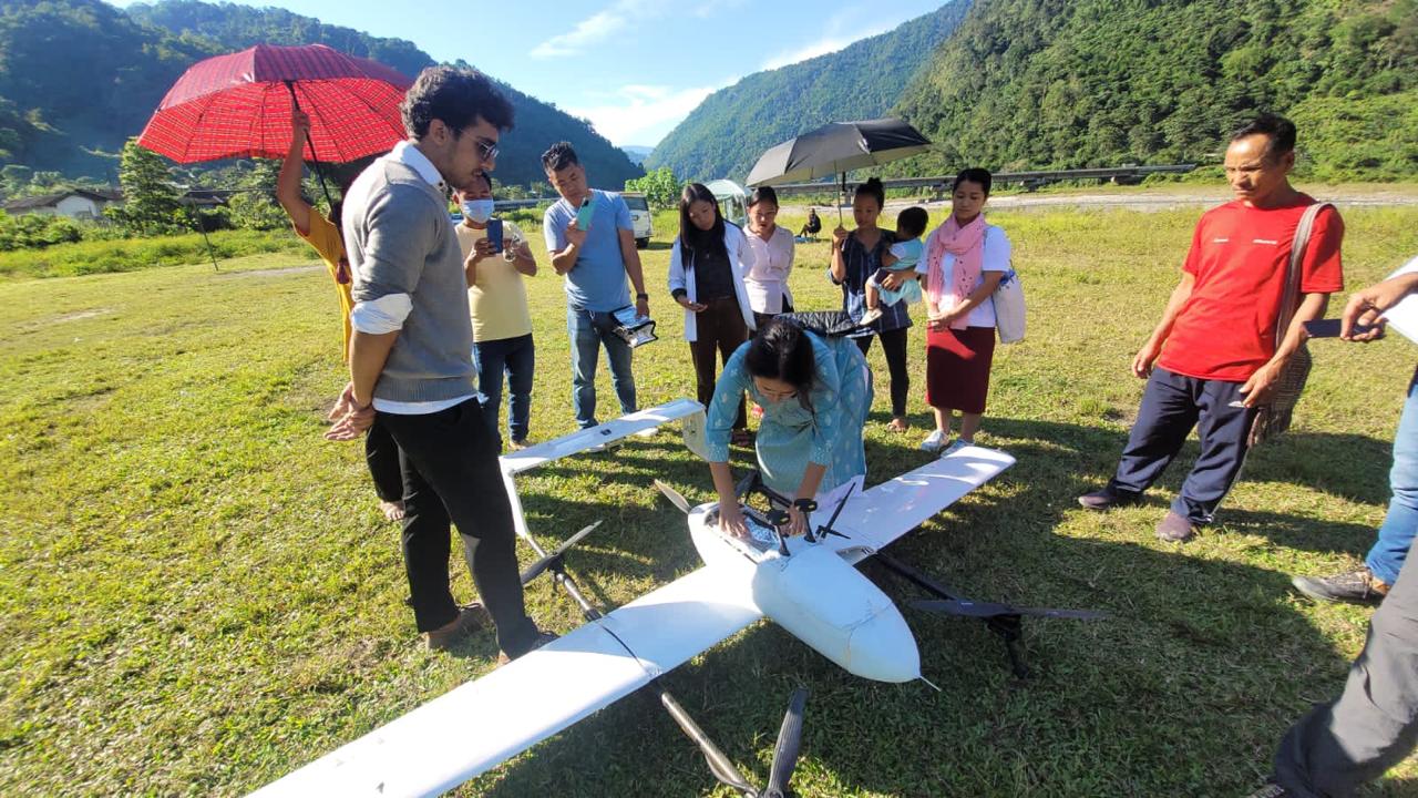 A drone built and operated by Redwing Labs is being mounted with a box of medicines for delivery at a remote health center in India