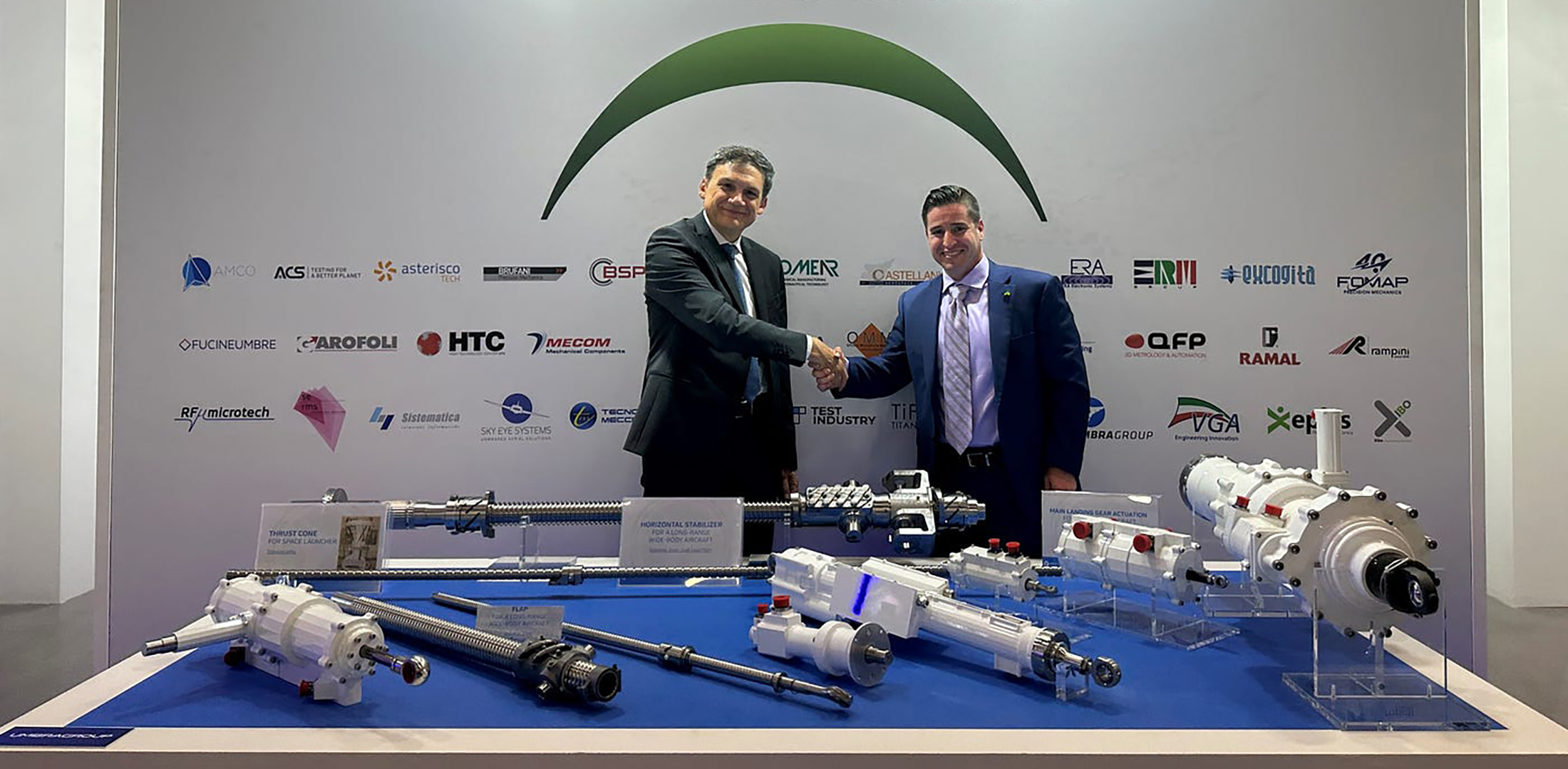 Umbra Group CEO Matteo Notarangelo and Supernal COO Adam Slepian shake hands after a signing ceremony for the partnership at the Paris airshow, on June 21, 2023. (Photo: Supernal)