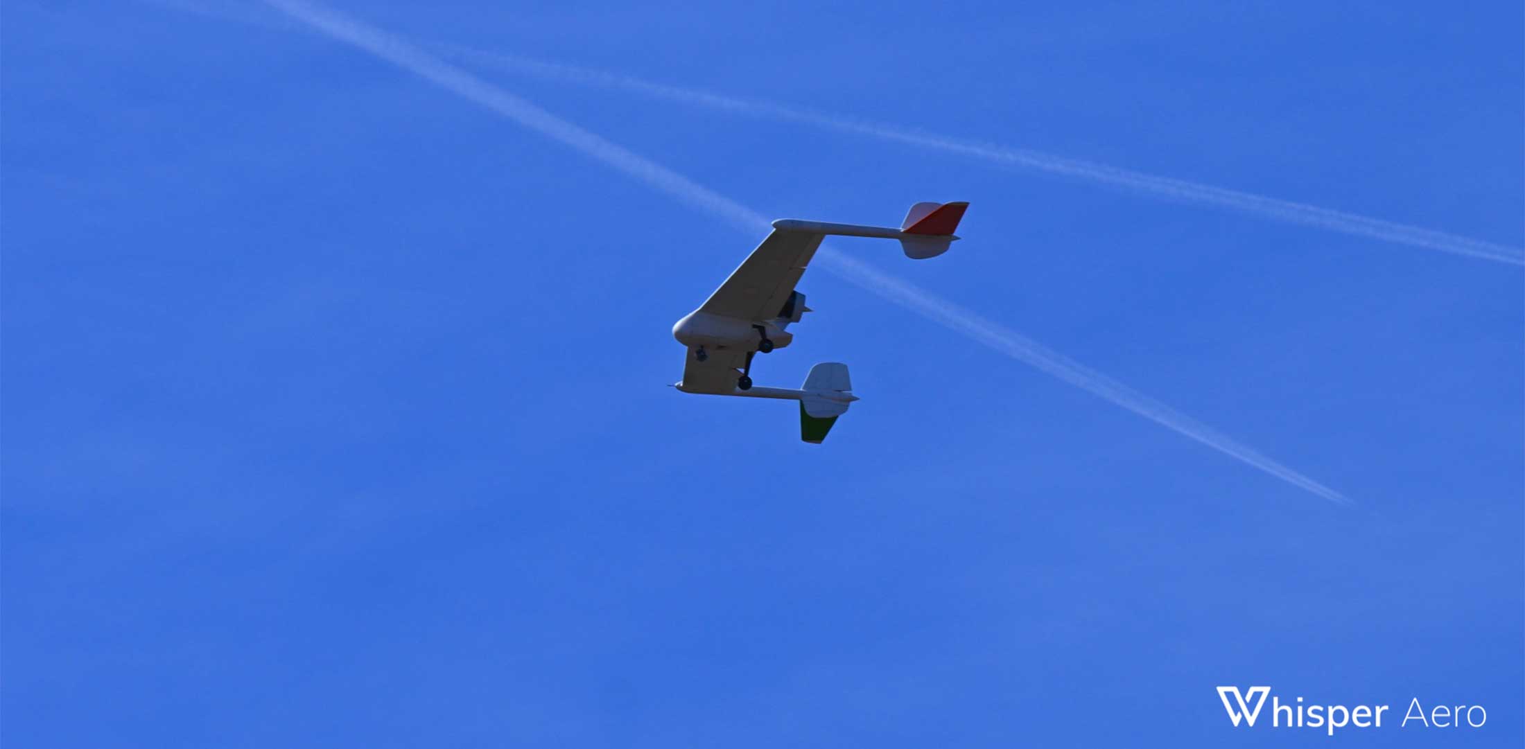 A drone equipped with Whisper Aero's electric ducted fan is pictured in flight.