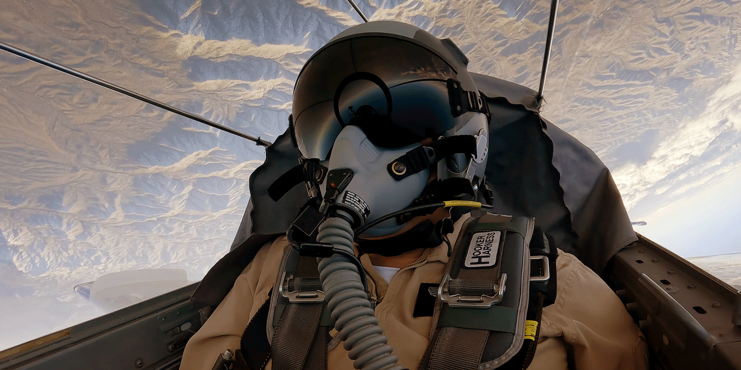 The view of the Arizona desert while upside-down in the S.211