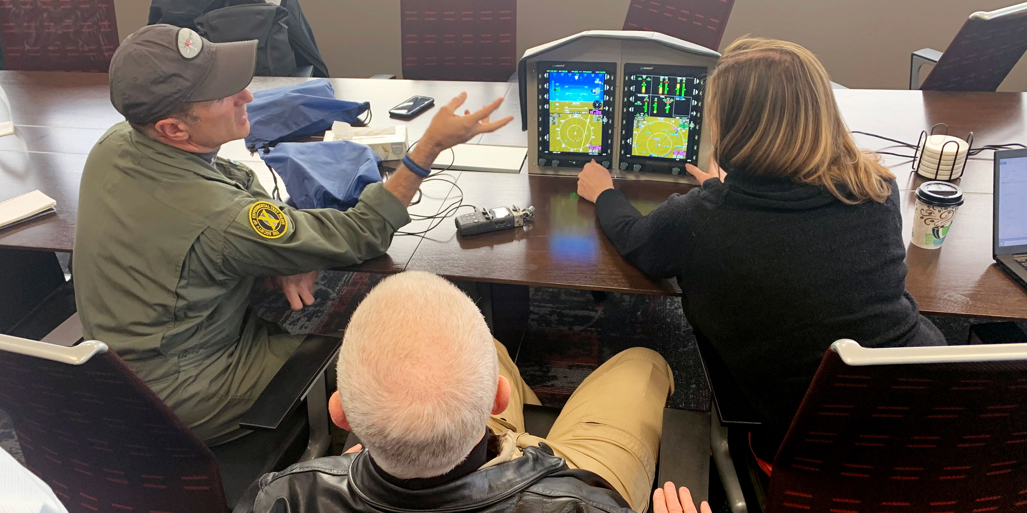 A preflight briefing is enhanced by a demo unit of the Genesys IDU-680 displays. Photo: Matt Thurber